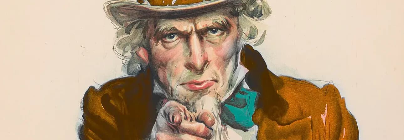 Stern man pointing at viewer